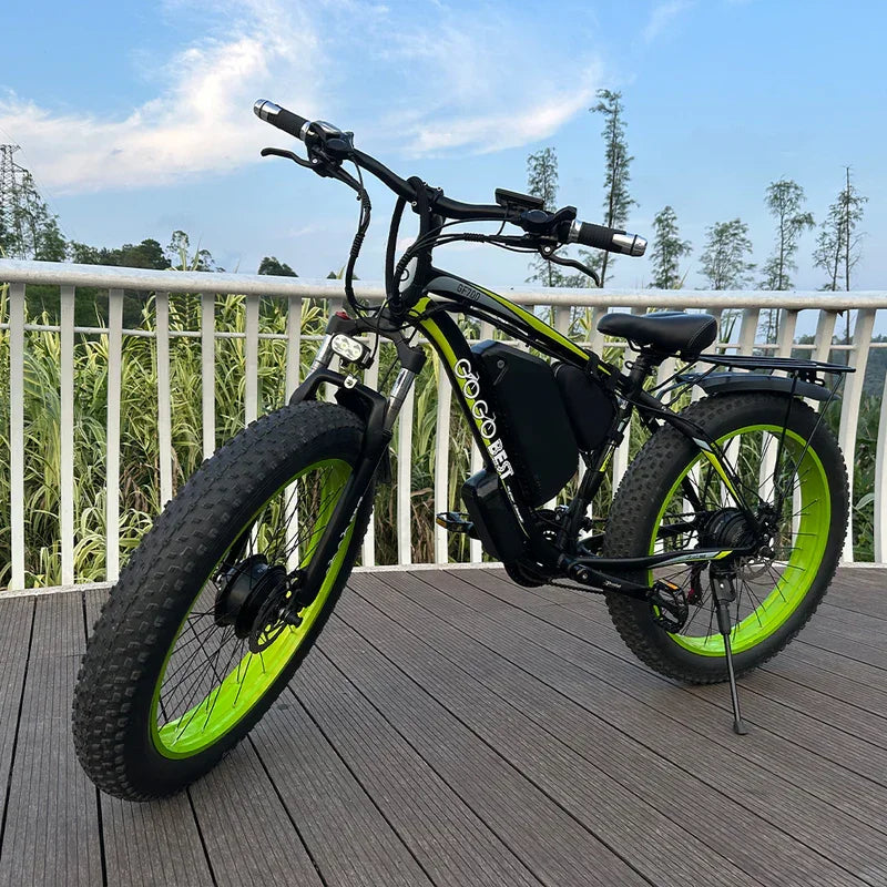 GOGOBEST GF700 electric bike in black and neon green, side view on outdoor deck