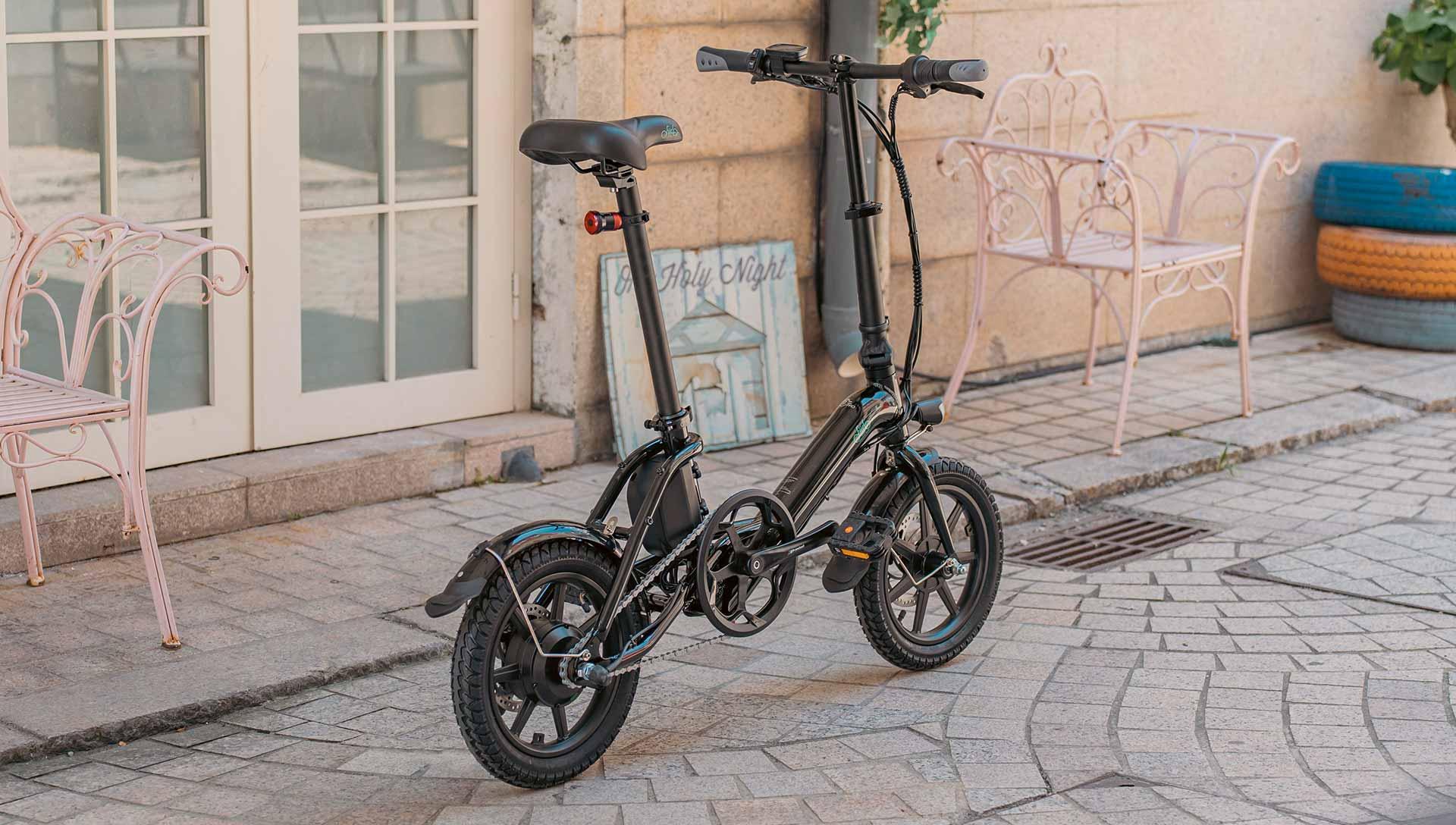Fiido D3 Pro electric bike in black, side view, parked on a cobblestone street
