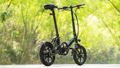 Fiido D3 Pro electric bike black side view with mudguard and light outdoors