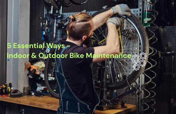 Mechanic performing rear wheel maintenance on an electric bike in a workshop, side view