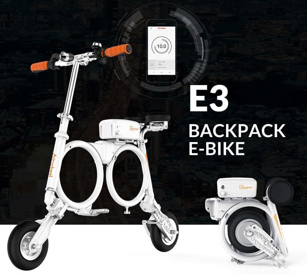 Airwheel E3 folding electric bike in white, side view and folded, with orange handlebar grips.